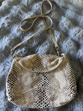 Snakeskin clutch or crossbody bag with removable strap
